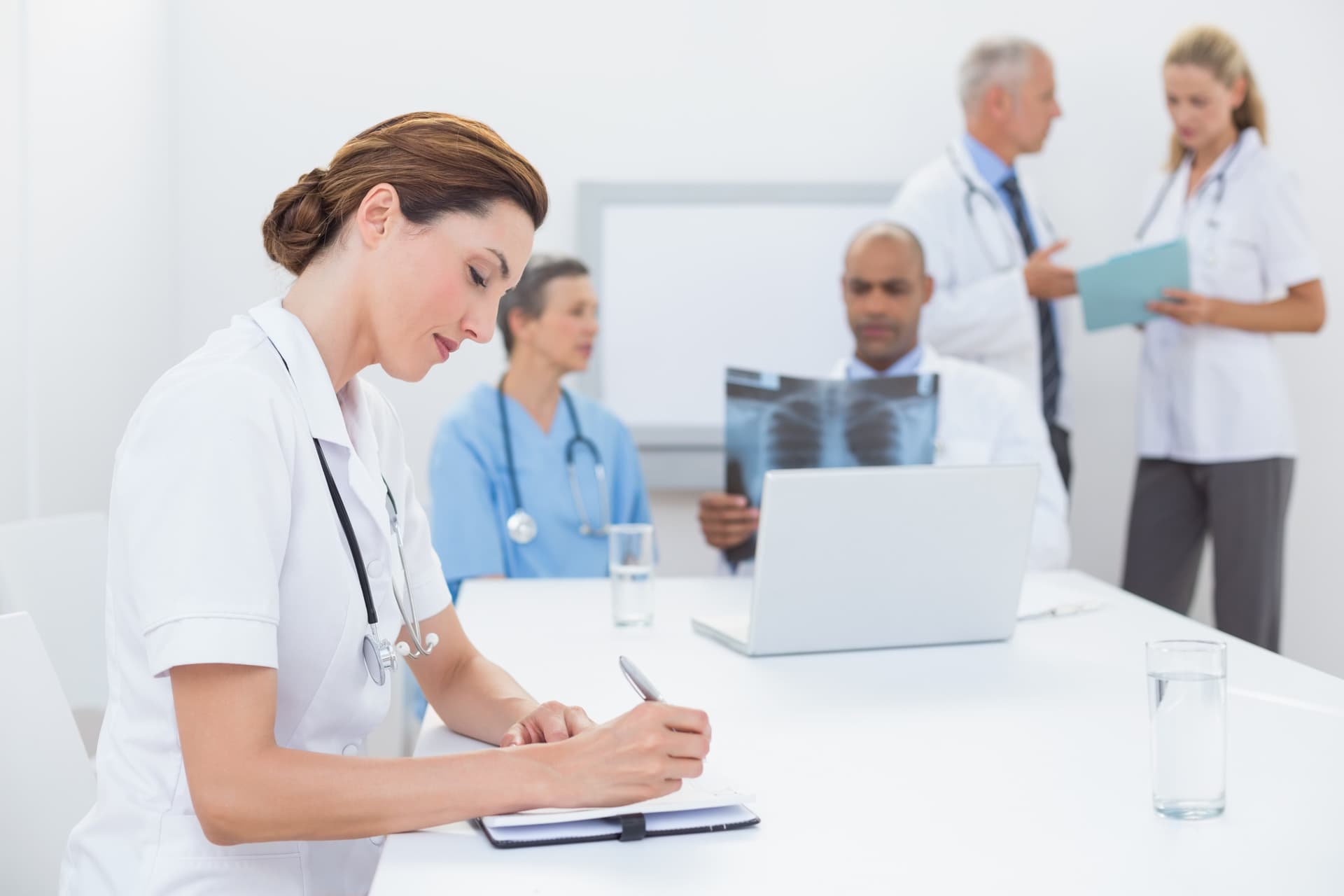 Nurse writing notes
